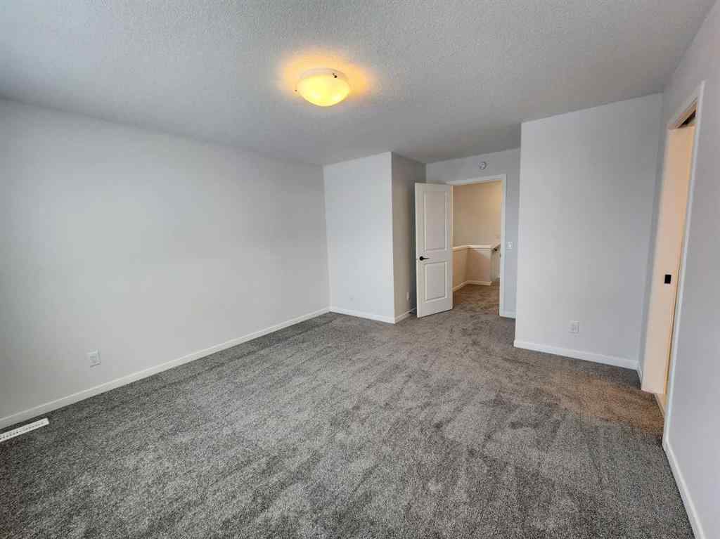 MLS® A2237555 - 575 Lucas Boulevard NW in Livingston Calgary, Residential