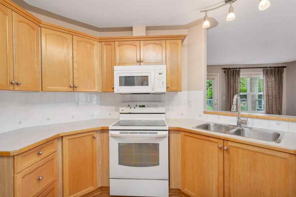 MLS® A2237570 - Unit #102 3501 49 Avenue  in South Hill Red Deer, Residential