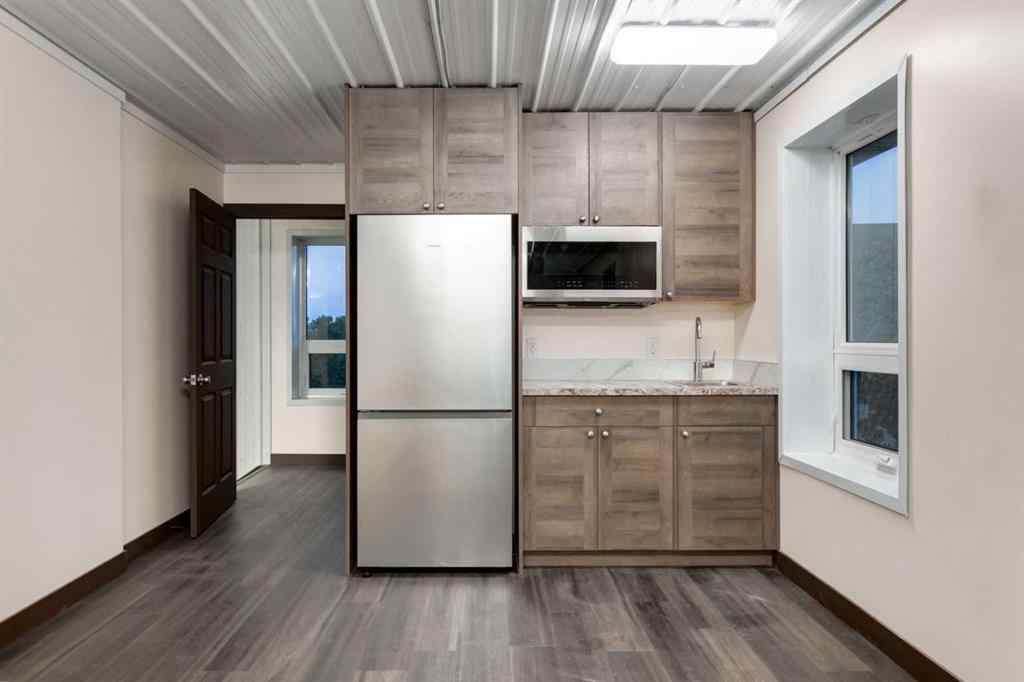 MLS® A2237587 - 288035 160 Avenue W in Priddis Woods Rural Foothills County, Residential
