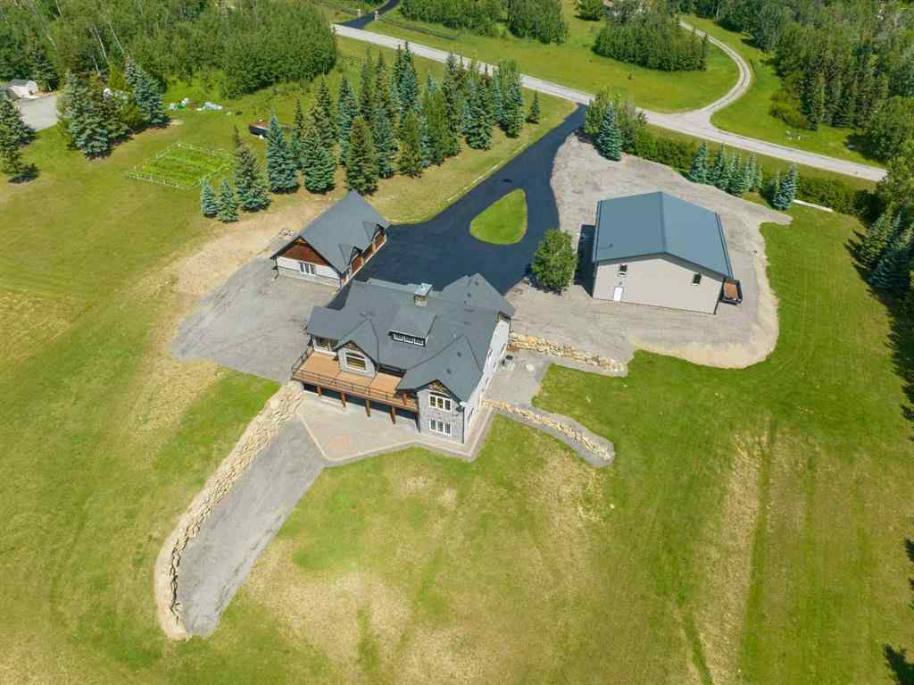 MLS® A2237587 - 288035 160 Avenue W in Priddis Woods Rural Foothills County, Residential