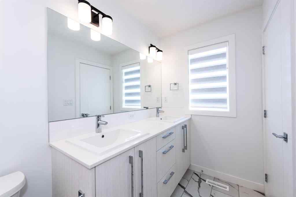 MLS® A2237634 - 7686 202 Avenue SE in Rangeview Calgary, Residential