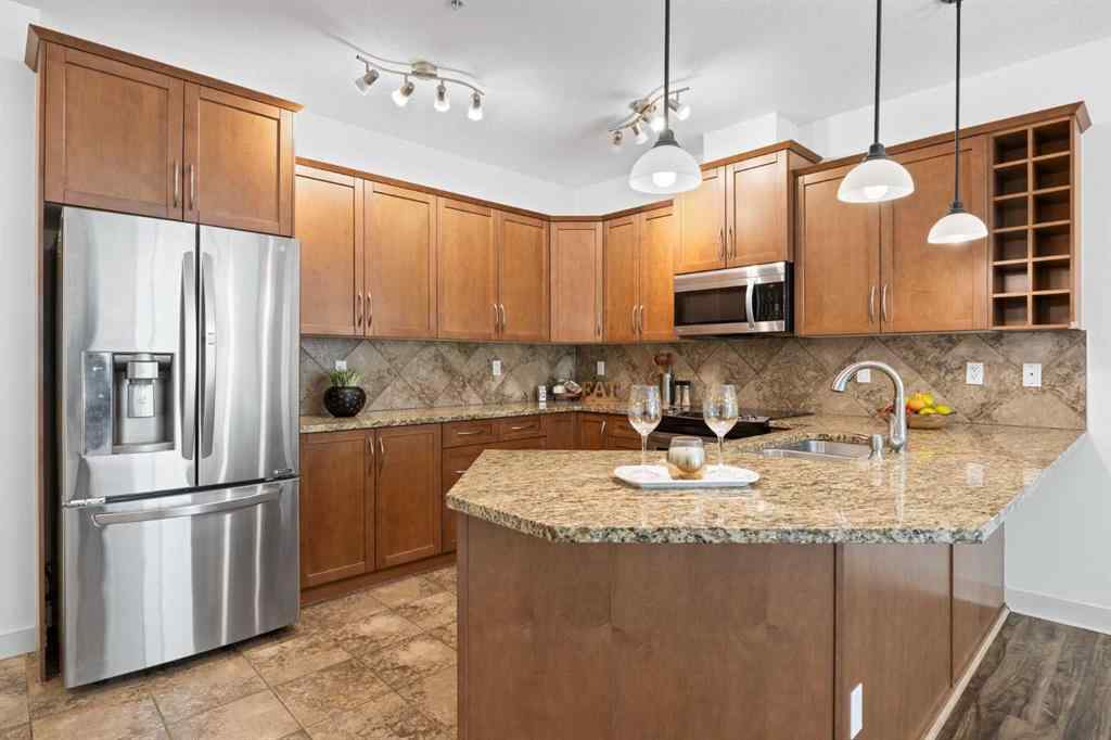 MLS® A2237649 - Unit #223 35 Aspenmont Heights SW in Aspen Woods Calgary, Residential