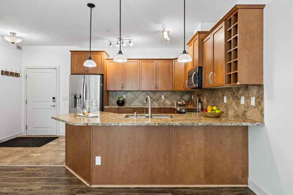 MLS® A2237649 - Unit #223 35 Aspenmont Heights SW in Aspen Woods Calgary, Residential