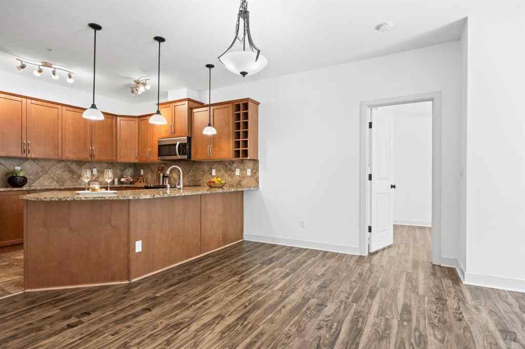 MLS® A2237649 - Unit #223 35 Aspenmont Heights SW in Aspen Woods Calgary, Residential
