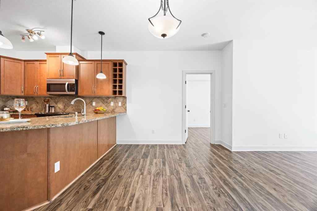 MLS® A2237649 - Unit #223 35 Aspenmont Heights SW in Aspen Woods Calgary, Residential