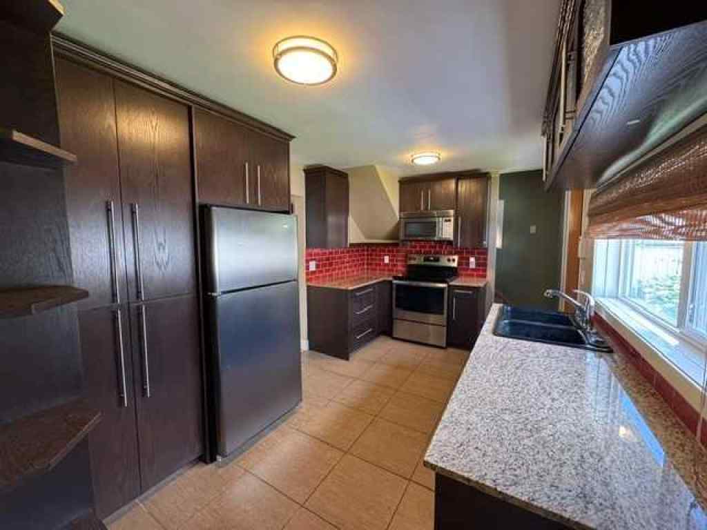 MLS® A2237655 - 134 31 Avenue NE in Tuxedo Park Calgary, Residential