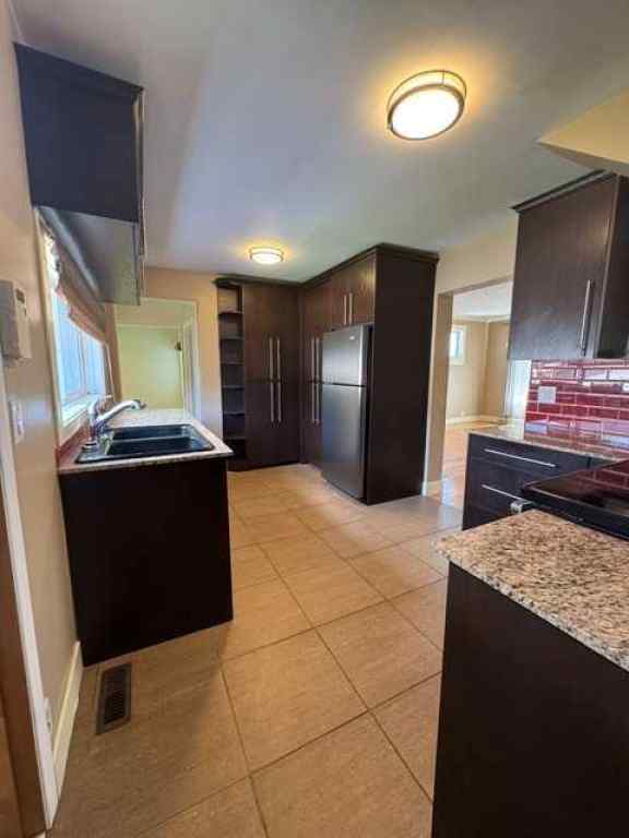 MLS® A2237655 - 134 31 Avenue NE in Tuxedo Park Calgary, Residential
