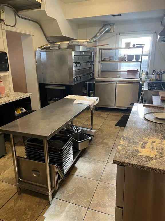 MLS® A2237713 - Unit #100 3811 Edmonton Trail NE in Greenview Calgary, Commercial