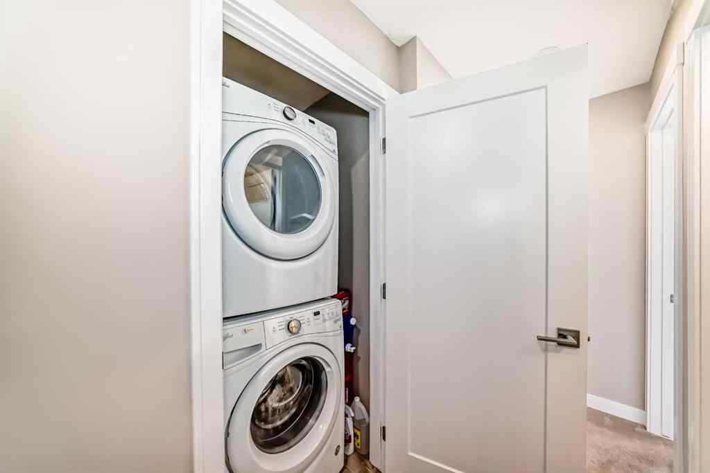 MLS® A2237720 - 209 Wentworth Row SW in West Springs Calgary, Residential