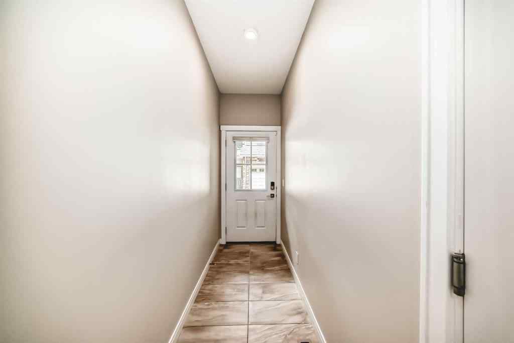 MLS® A2237720 - 209 Wentworth Row SW in West Springs Calgary, Residential