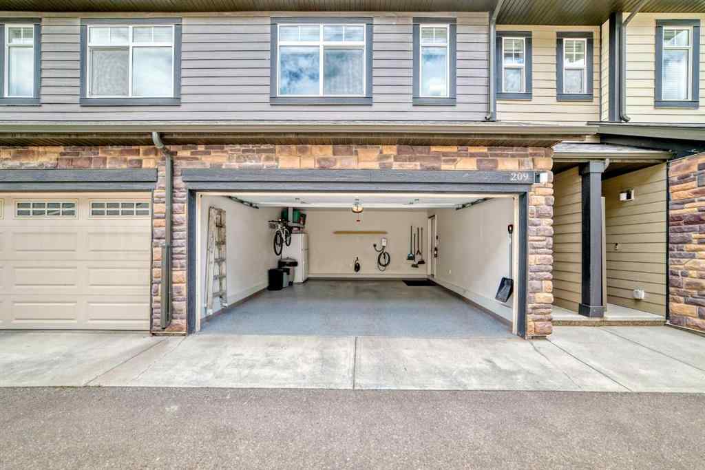 MLS® A2237720 - 209 Wentworth Row SW in West Springs Calgary, Residential
