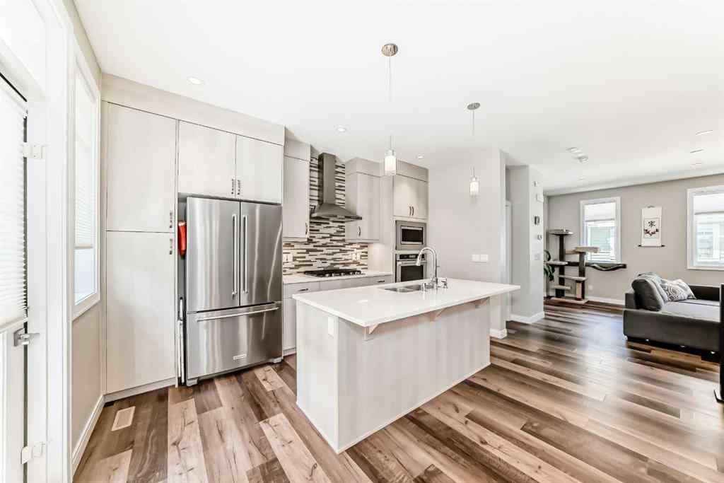 MLS® A2237720 - 209 Wentworth Row SW in West Springs Calgary, Residential