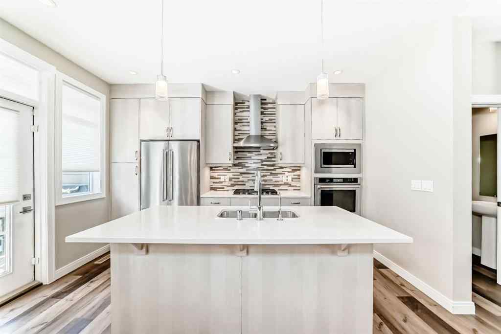 MLS® A2237720 - 209 Wentworth Row SW in West Springs Calgary, Residential