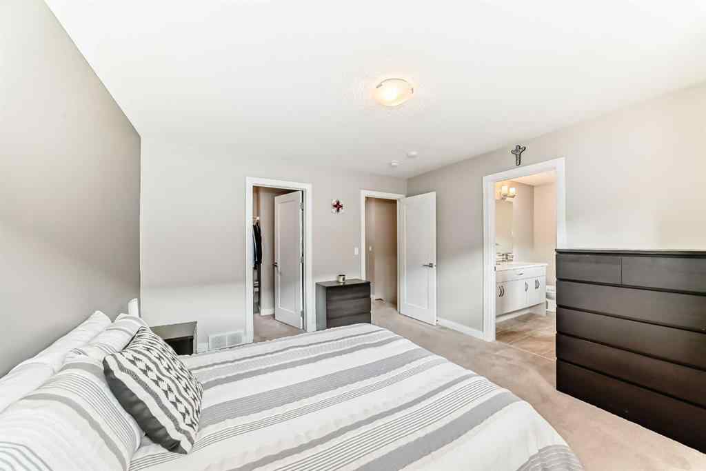 MLS® A2237720 - 209 Wentworth Row SW in West Springs Calgary, Residential