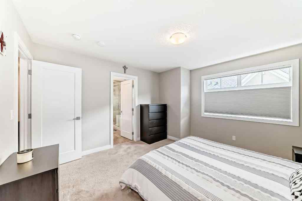 MLS® A2237720 - 209 Wentworth Row SW in West Springs Calgary, Residential