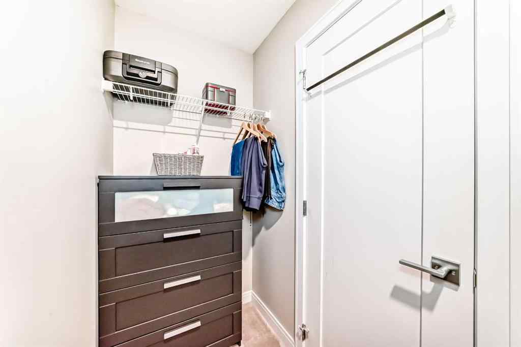 MLS® A2237720 - 209 Wentworth Row SW in West Springs Calgary, Residential