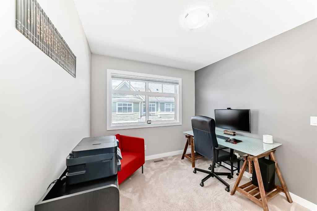 MLS® A2237720 - 209 Wentworth Row SW in West Springs Calgary, Residential