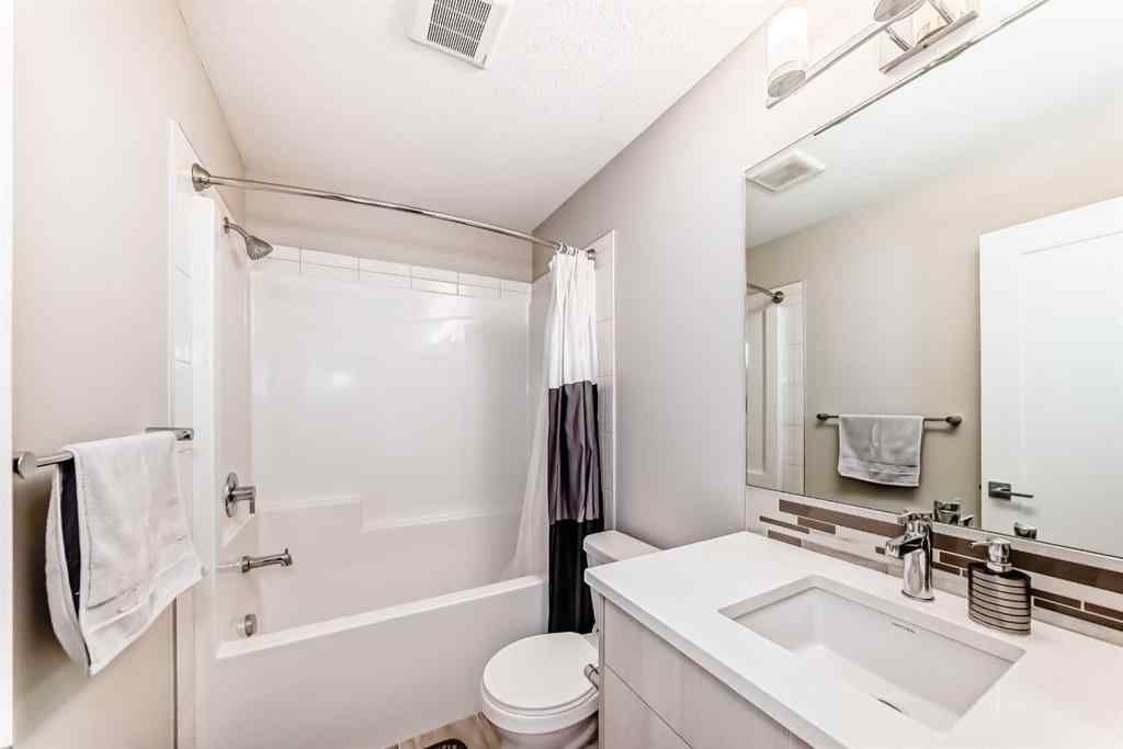 MLS® A2237720 - 209 Wentworth Row SW in West Springs Calgary, Residential