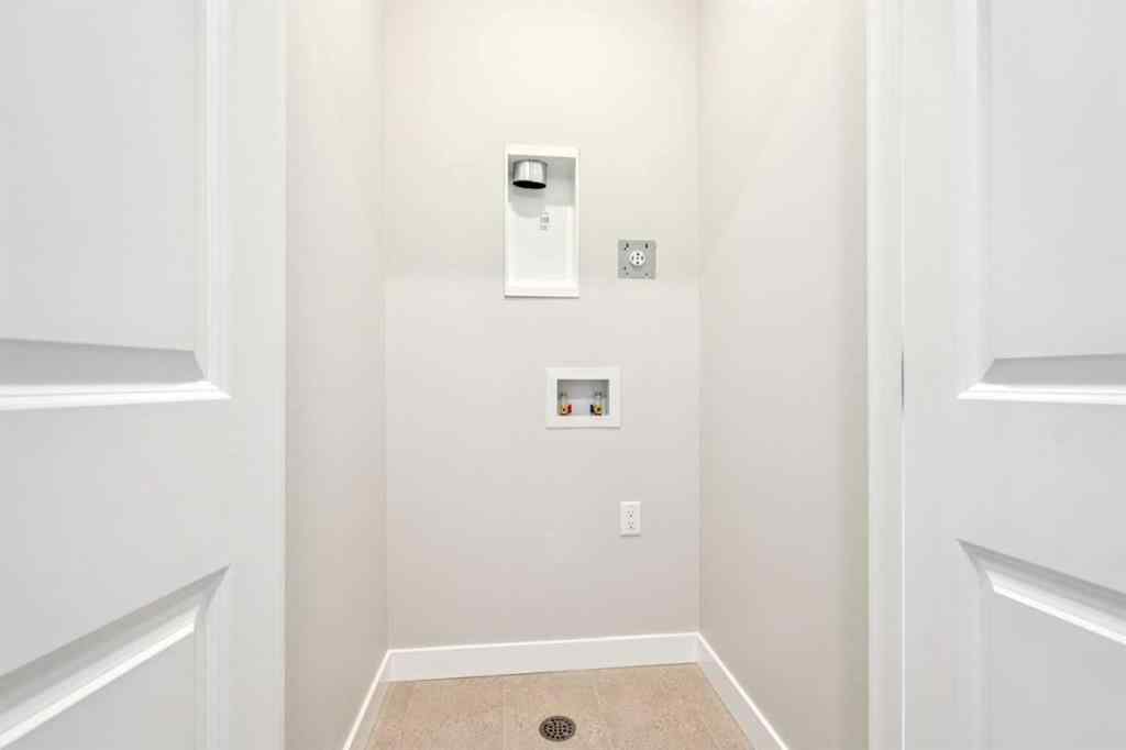 MLS® A2237753 - 53 Bluerock Hill SW in Alpine Park Calgary, Residential
