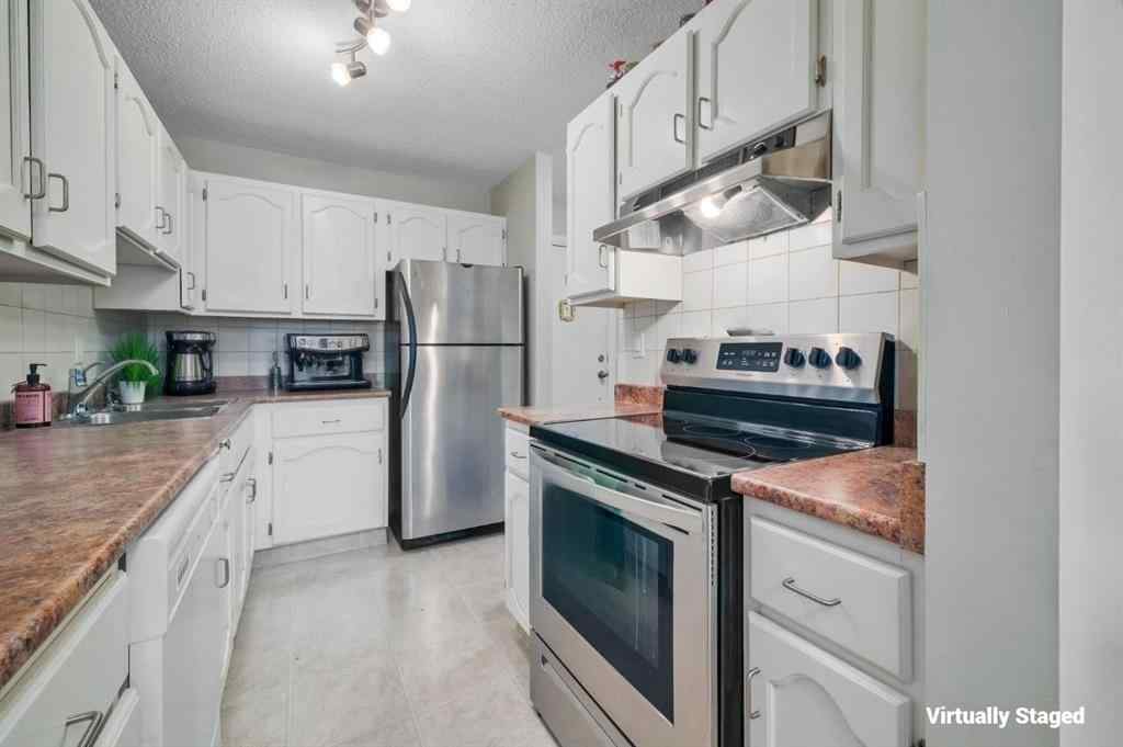 MLS® A2237762 - Unit #102 611 67 Avenue SW in Kingsland Calgary, Residential