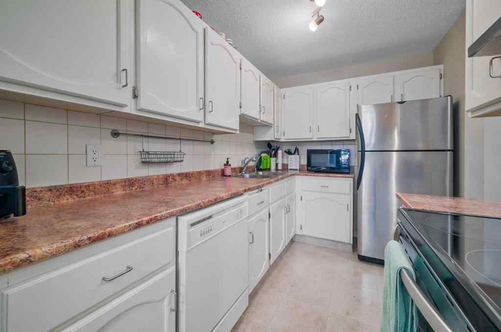 MLS® A2237762 - Unit #102 611 67 Avenue SW in Kingsland Calgary, Residential