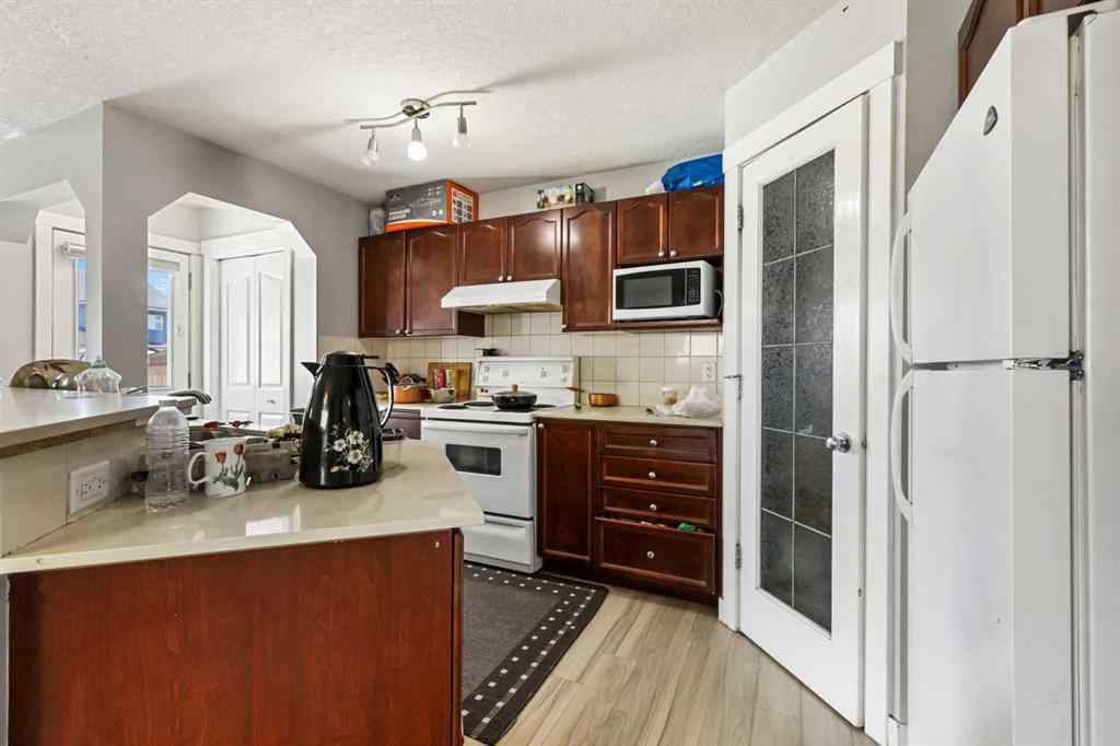 MLS® A2237811 - 9234 Saddlebrook Drive NE in Saddle Ridge Calgary, Residential