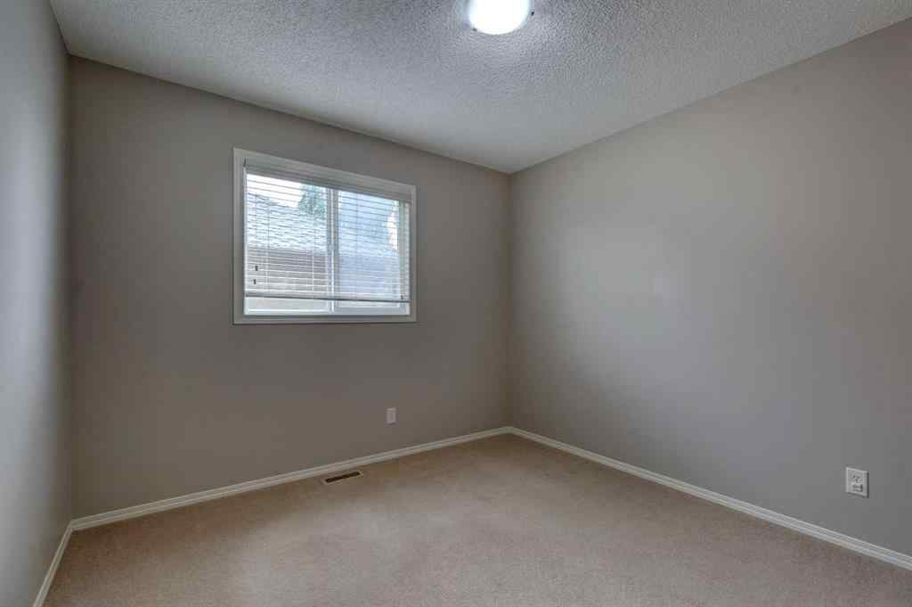 MLS® A2237830 - 587 Everbrook Way SW in Evergreen Calgary, Residential