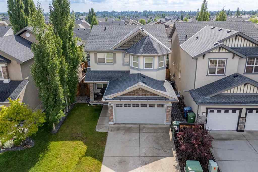 MLS® A2237830 - 587 Everbrook Way SW in Evergreen Calgary, Residential