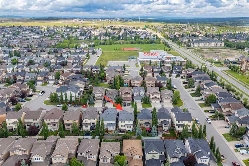 MLS® A2237830 - 587 Everbrook Way SW in Evergreen Calgary, Residential