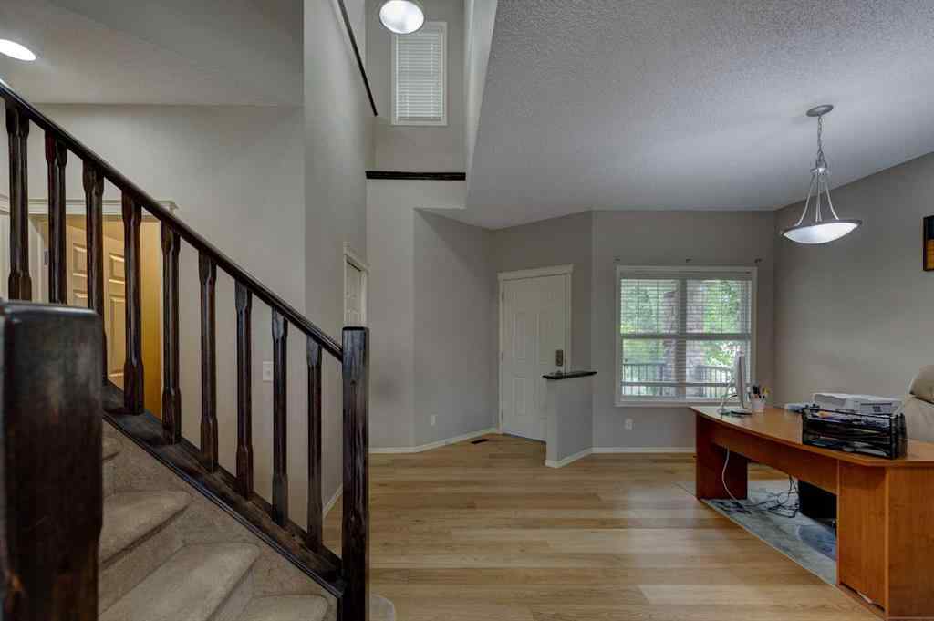 MLS® A2237830 - 587 Everbrook Way SW in Evergreen Calgary, Residential