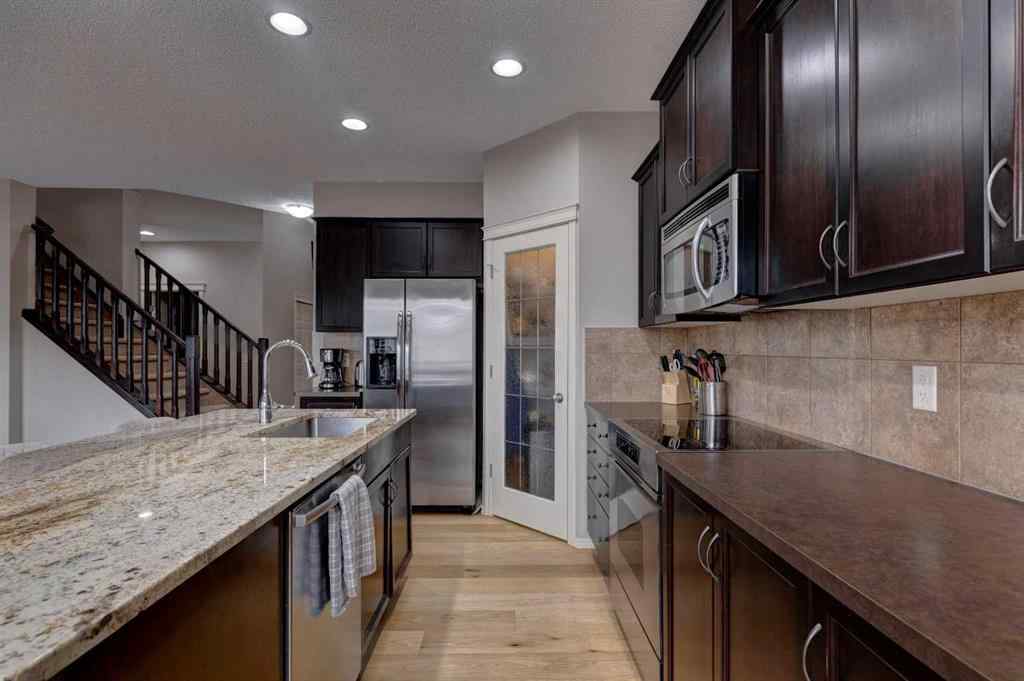 MLS® A2237830 - 587 Everbrook Way SW in Evergreen Calgary, Residential