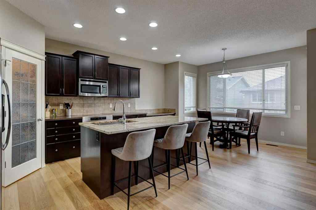 MLS® A2237830 - 587 Everbrook Way SW in Evergreen Calgary, Residential