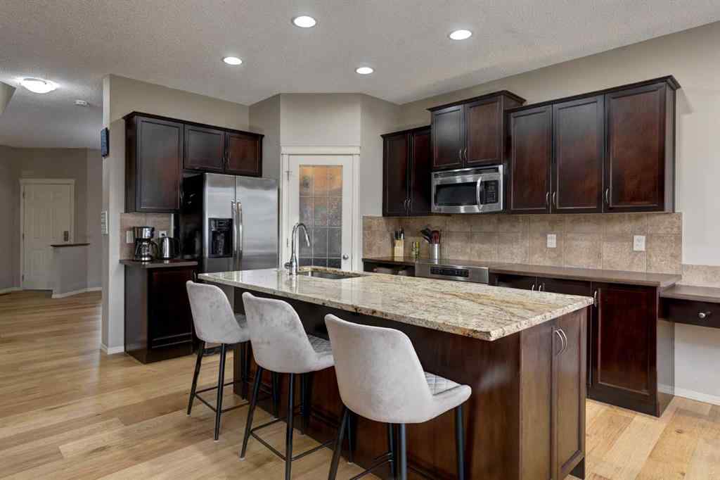 MLS® A2237830 - 587 Everbrook Way SW in Evergreen Calgary, Residential