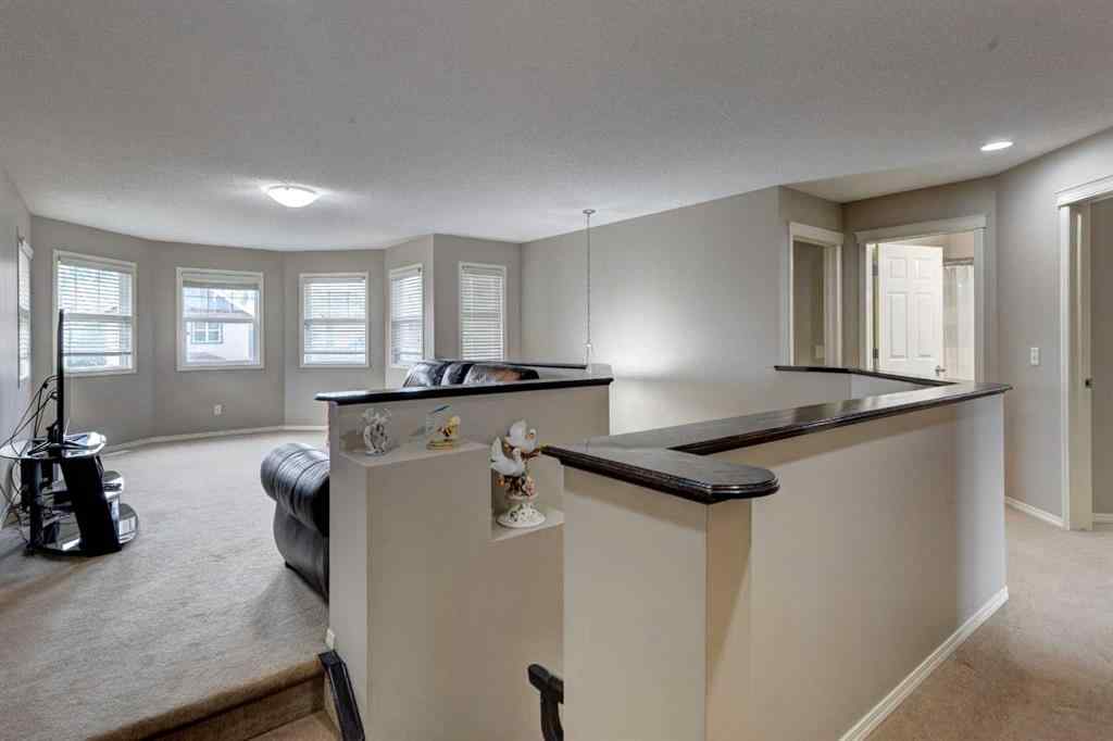 MLS® A2237830 - 587 Everbrook Way SW in Evergreen Calgary, Residential