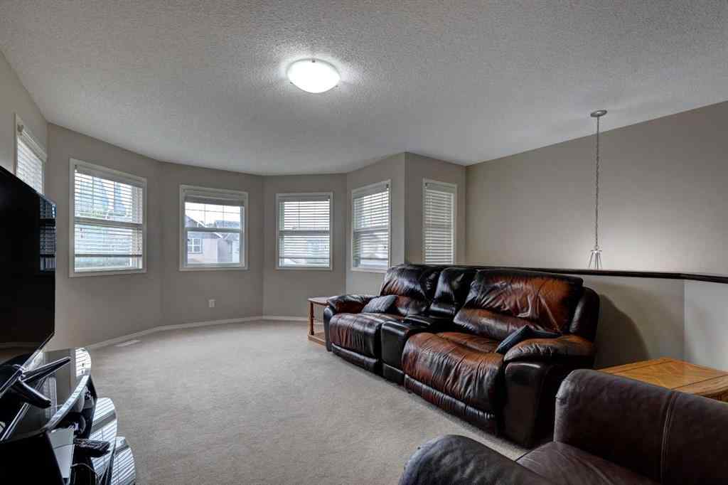MLS® A2237830 - 587 Everbrook Way SW in Evergreen Calgary, Residential