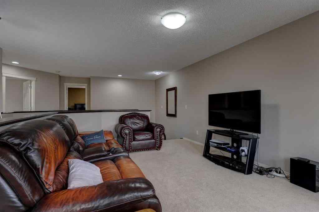 MLS® A2237830 - 587 Everbrook Way SW in Evergreen Calgary, Residential