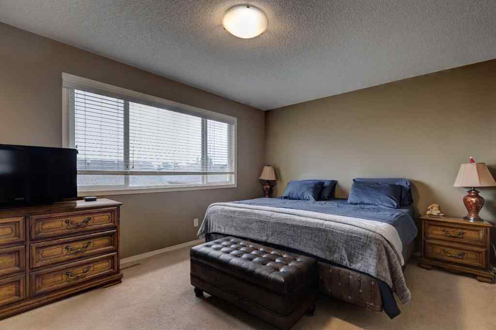 MLS® A2237830 - 587 Everbrook Way SW in Evergreen Calgary, Residential