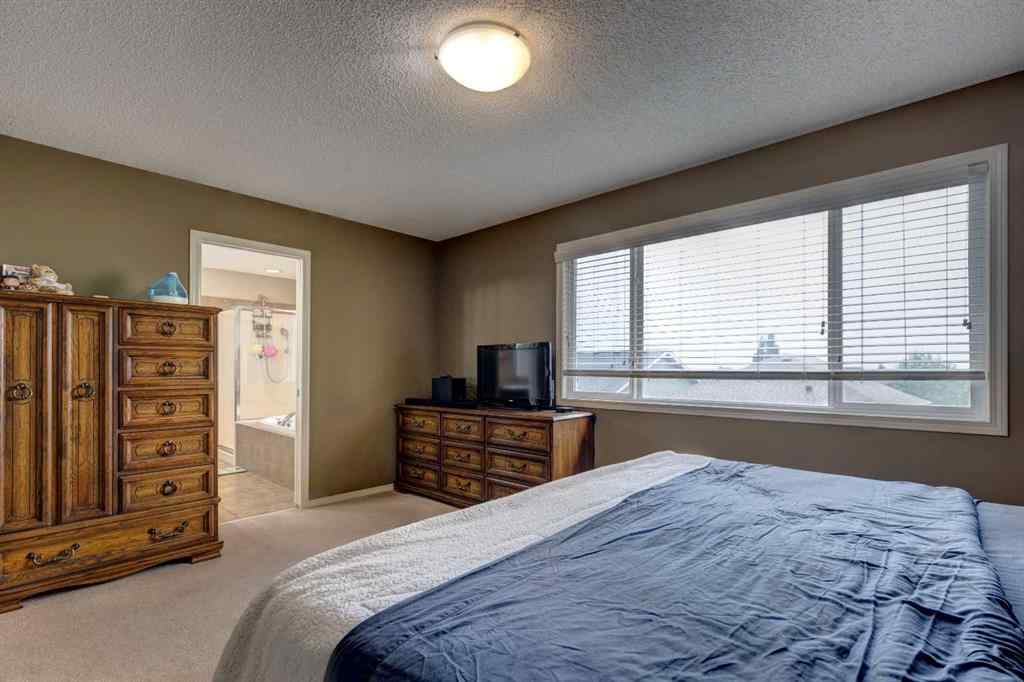MLS® A2237830 - 587 Everbrook Way SW in Evergreen Calgary, Residential