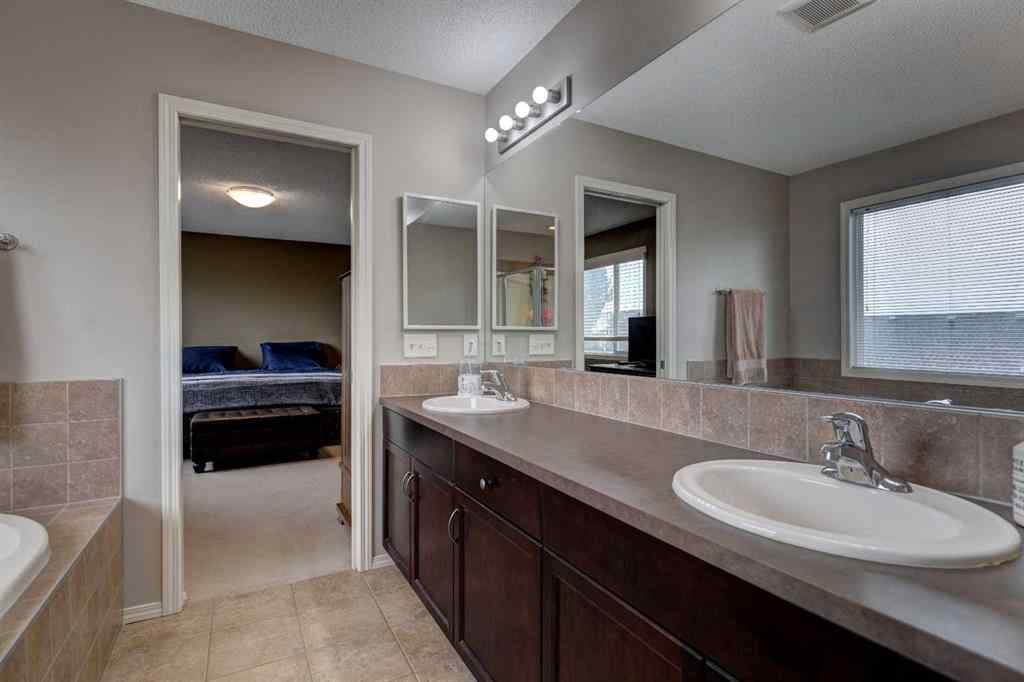 MLS® A2237830 - 587 Everbrook Way SW in Evergreen Calgary, Residential