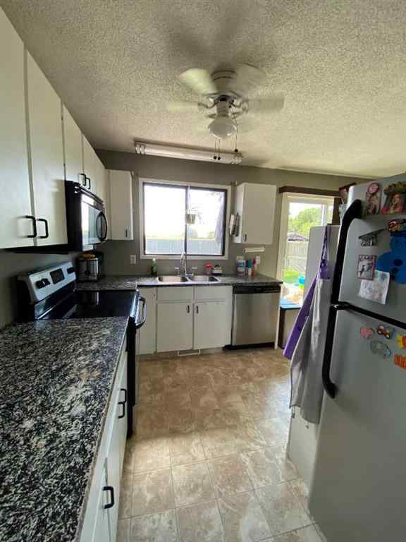 MLS® A2237888 - 99 Wildrose Avenue W in Sunnylea Brooks, Residential