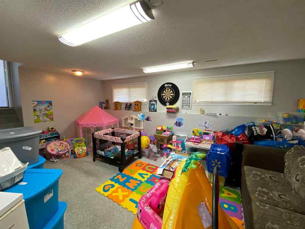 MLS® A2237888 - 99 Wildrose Avenue W in Sunnylea Brooks, Residential