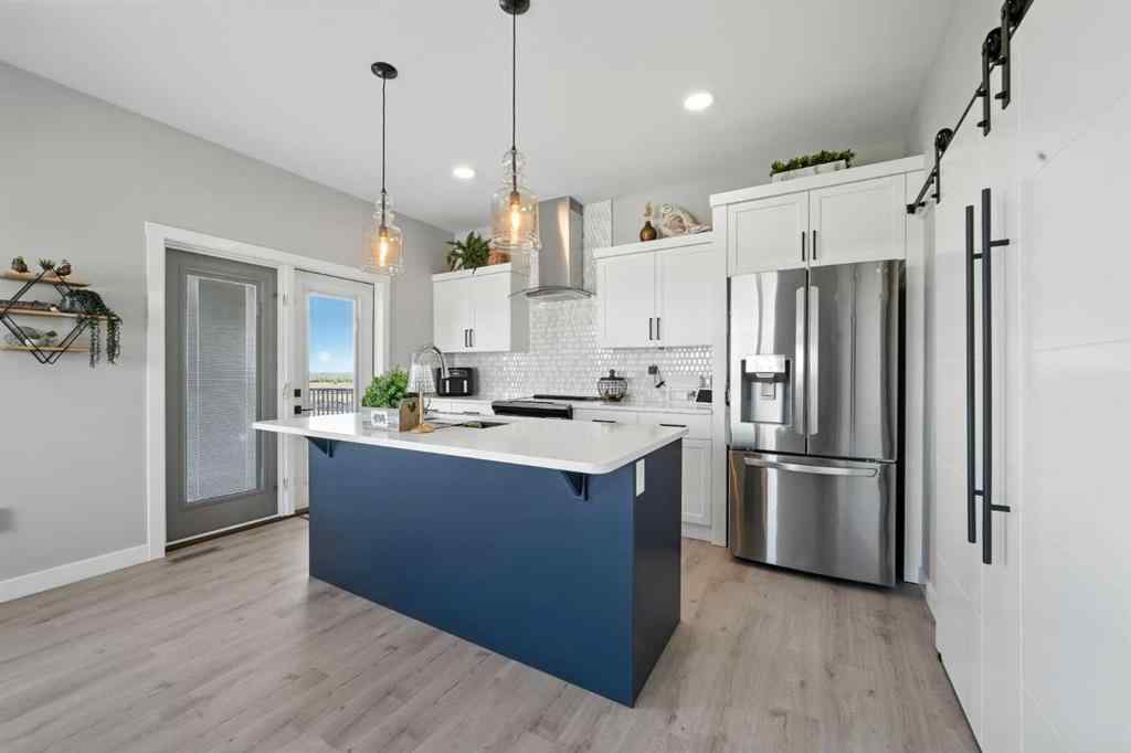 MLS® A2237900 - 124 Eastpointe Drive  in Mckay Ranch Blackfalds, Residential