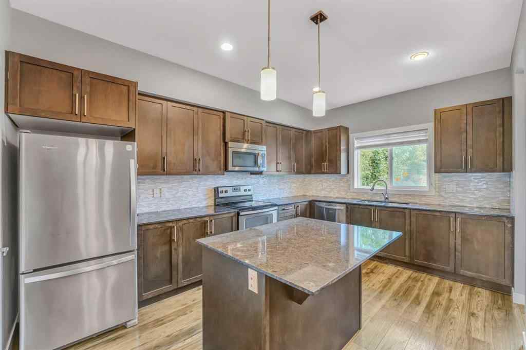 MLS® A2237905 - 315 Hillcrest Drive SW in Hillcrest Airdrie, Residential