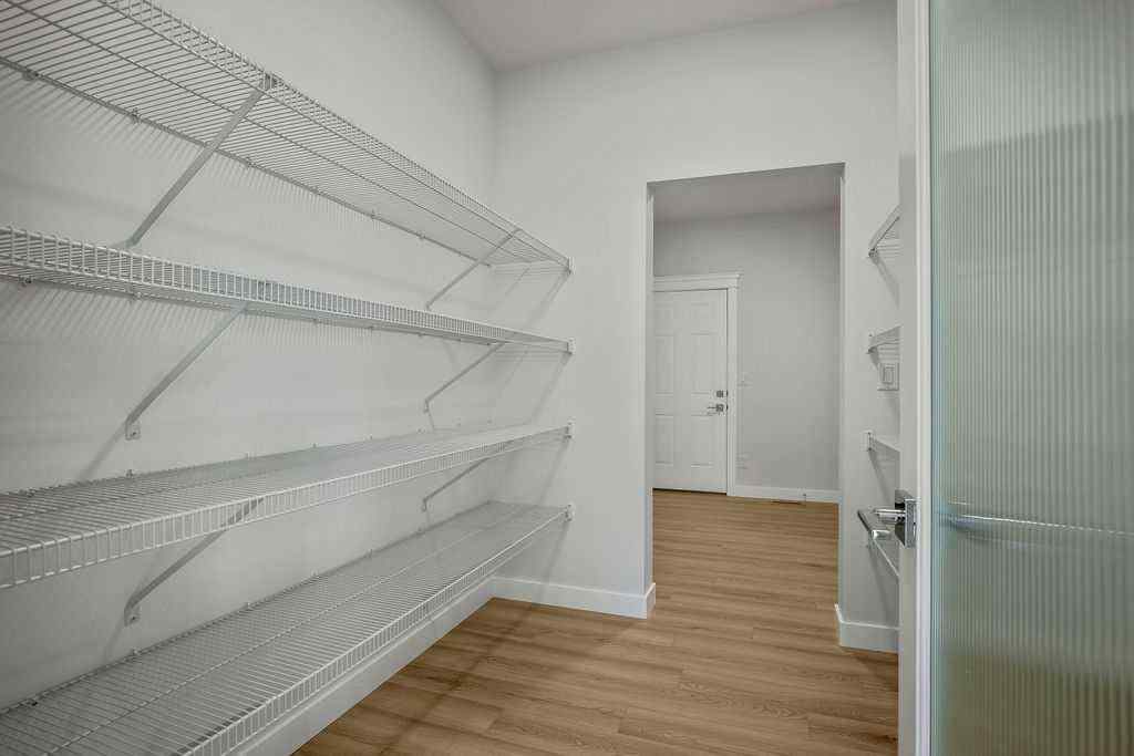 MLS® A2237918 - 229 Creekstone Hill SW in Pine Creek Calgary, Residential
