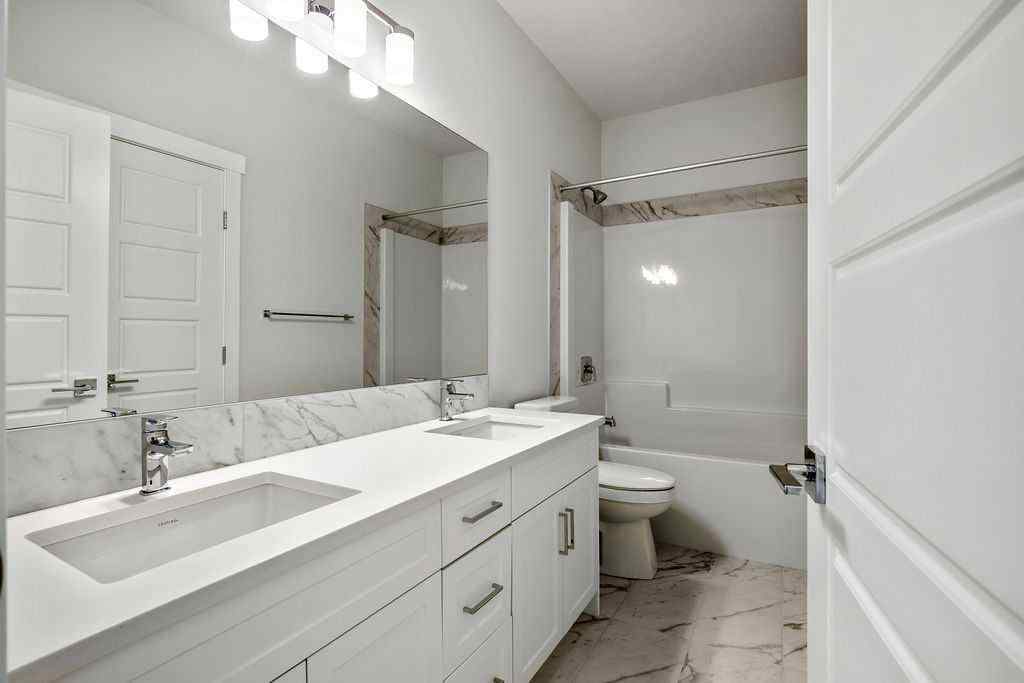 MLS® A2237918 - 229 Creekstone Hill SW in Pine Creek Calgary, Residential