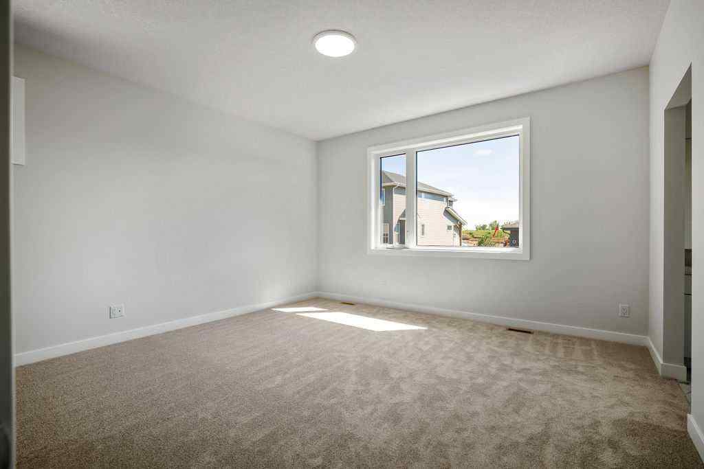 MLS® A2237918 - 229 Creekstone Hill SW in Pine Creek Calgary, Residential