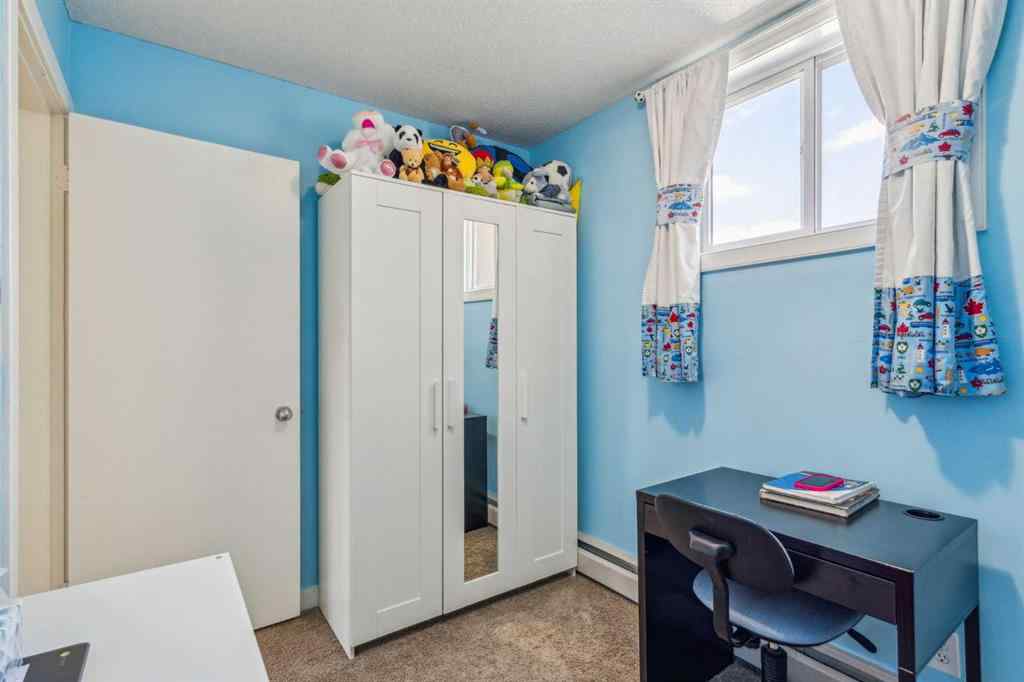 MLS® A2237932 - Unit #130 3809 45 Street SW in Glenbrook Calgary, Residential