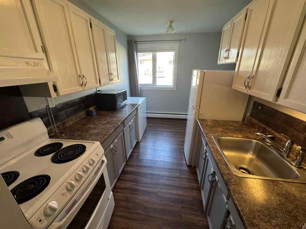 MLS® A2237949 - Unit #104 10230 106 Avenue  in Avondale Grande Prairie, Residential