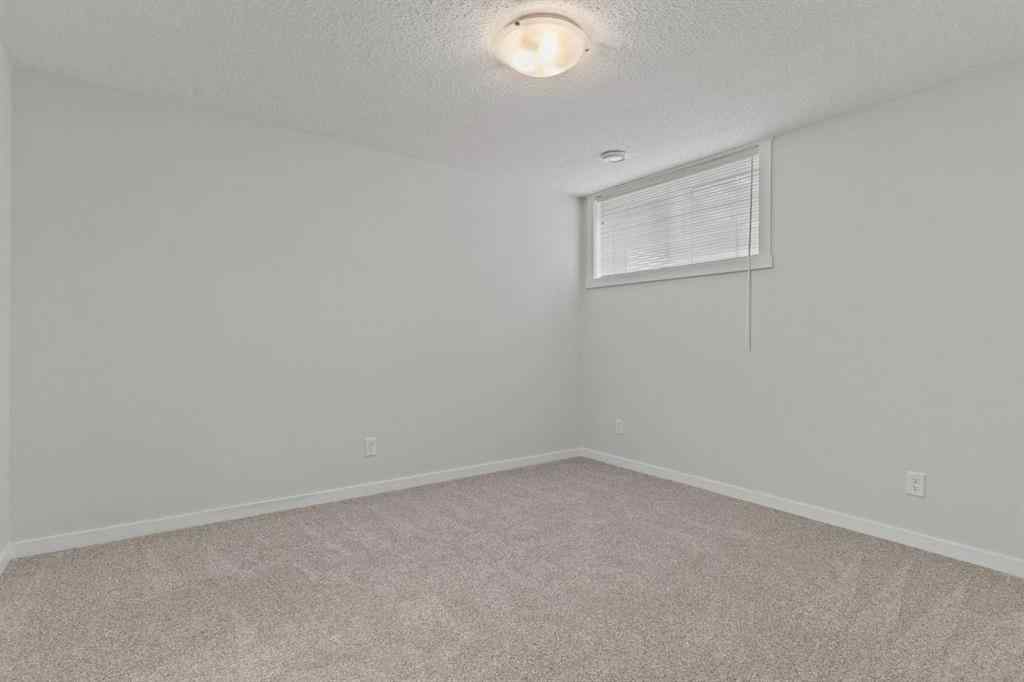 MLS® A2237950 - 414 Cranbrook Square SE in Cranston Calgary, Residential
