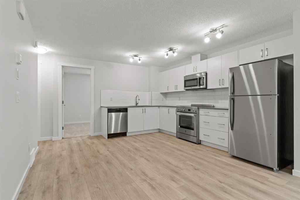 MLS® A2237950 - 414 Cranbrook Square SE in Cranston Calgary, Residential